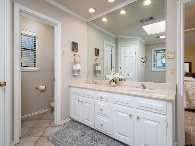 6109 Stoneleigh Dr, Tyler, TX 75703 - full bathroom featuring a sink, ornamental molding, a skylight, and recessed lighting
