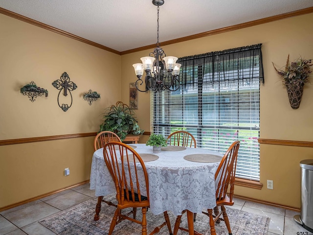 6109 Stoneleigh Dr, Tyler, TX 75703 - dining area with baseboards, tile patterned floors, a chandelier, and crown molding
