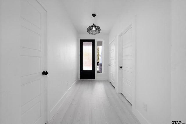 entryway with light hardwood / wood-style flooring