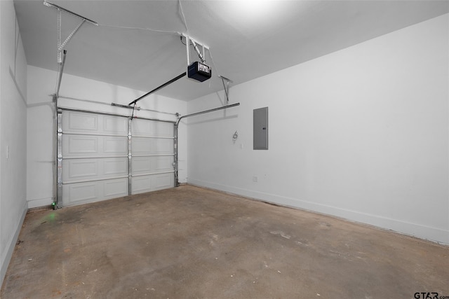 garage with electric panel and a garage door opener