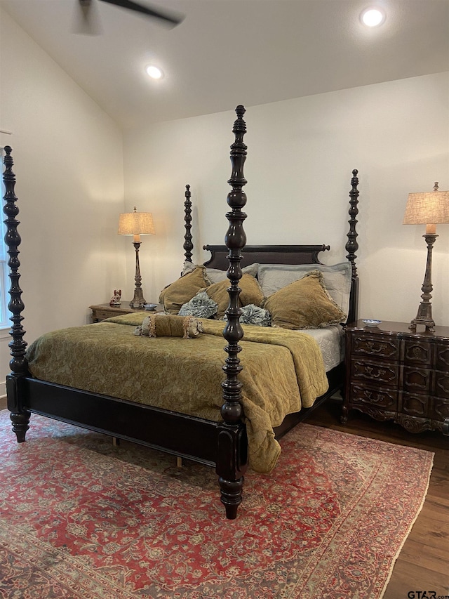 bedroom featuring ceiling fan and dark wood-type flooring