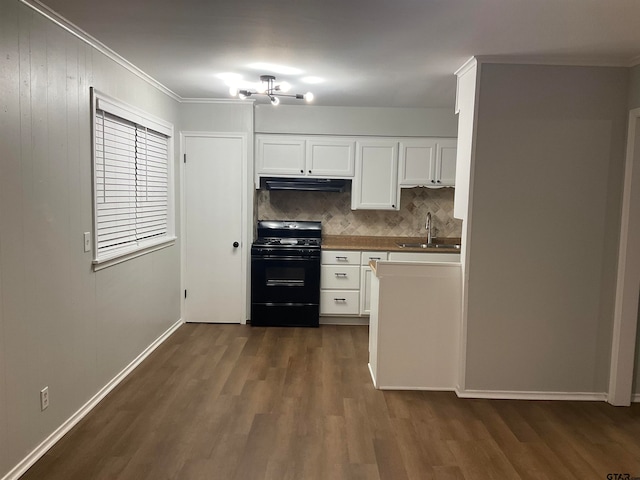 kitchen featuring sink, dark hardwood / wood-style flooring, white cabinets, black range, and decorative backsplash