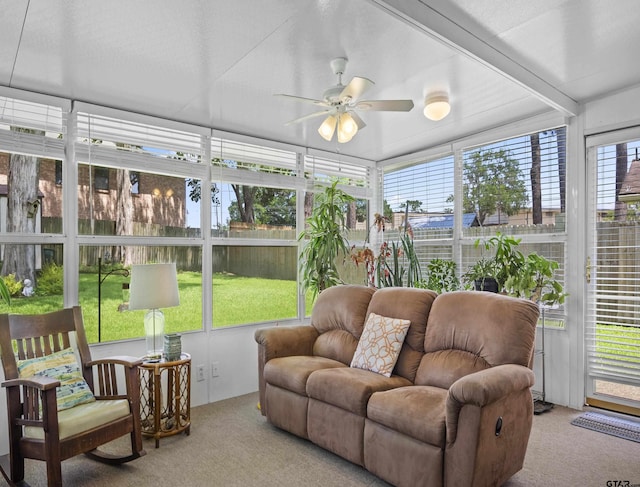 sunroom with ceiling fan