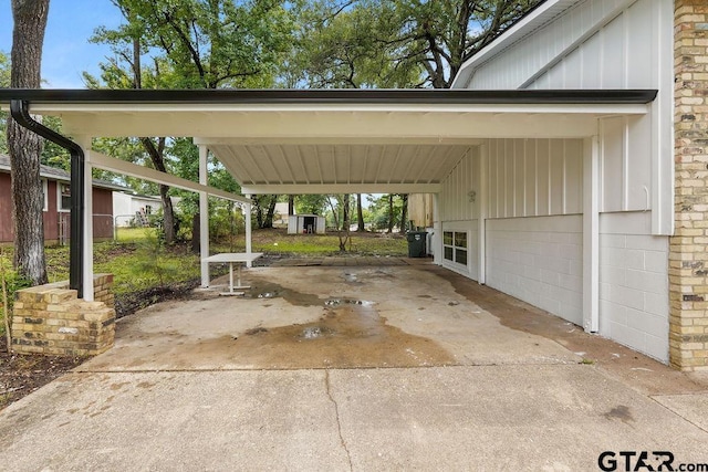 2442 E Devine, Tyler, TX 75701 - view of parking / parking lot with a carport and concrete driveway