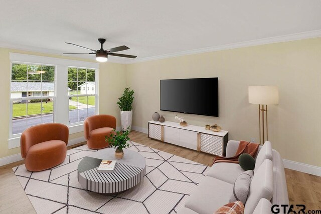 2442 E Devine, Tyler, TX 75701 - living room with crown molding, light wood-style floors, baseboards, and a ceiling fan