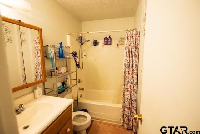 304 Blake Dr, Longview, TX 75604 - full bath with a textured ceiling, vanity, and shower / tub combo