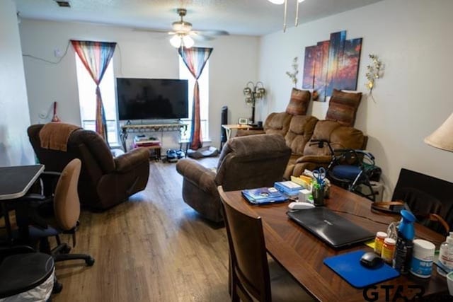 304 Blake Dr, Longview, TX 75604 - living room featuring ceiling fan, wood finished floors, and a desk