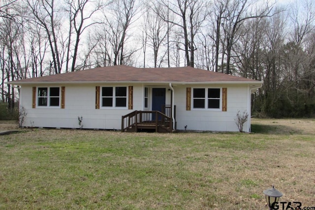 single story home with a front lawn