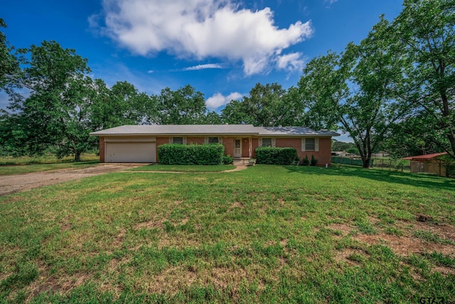 126 Jordan, Rusk, TX 75785 - ranch-style home with dirt driveway, an attached garage, and brick siding