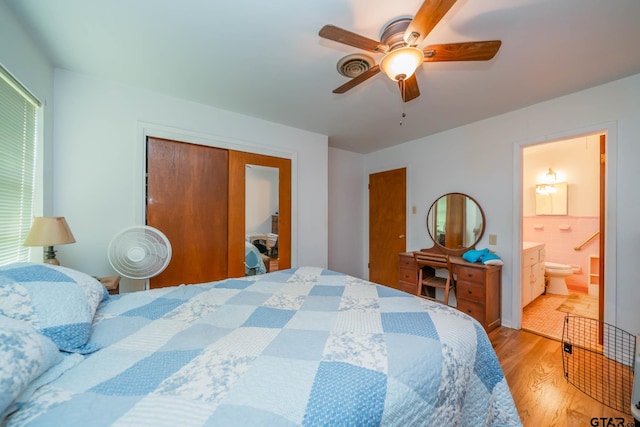 126 Jordan, Rusk, TX 75785 - bedroom with light wood-style flooring, a closet, a ceiling fan, and ensuite bathroom