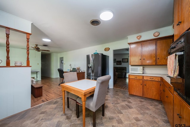 126 Jordan, Rusk, TX 75785 - dining space featuring a ceiling fan and stone finish flooring