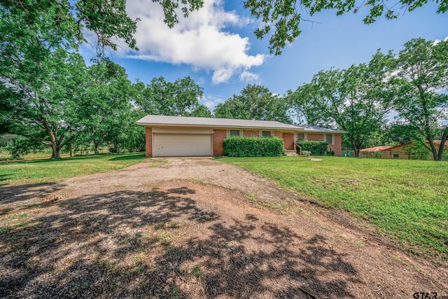 126 Jordan, Rusk, TX 75785 - ranch-style house with driveway, brick siding, an attached garage, and a front lawn