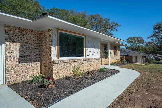 2014 Miller Dr, Tyler, TX 75701 - view of home's exterior with brick siding