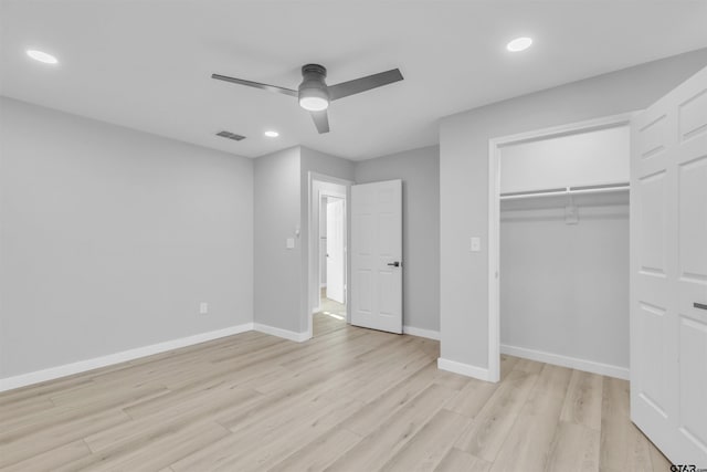 unfurnished bedroom with light wood-type flooring, visible vents, baseboards, and recessed lighting