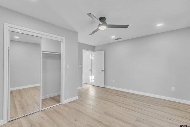 unfurnished bedroom featuring recessed lighting, visible vents, baseboards, a closet, and light wood finished floors