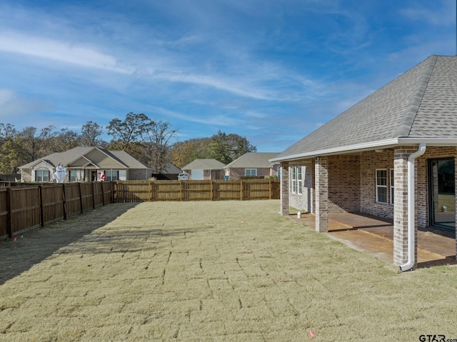 view of yard featuring a patio area