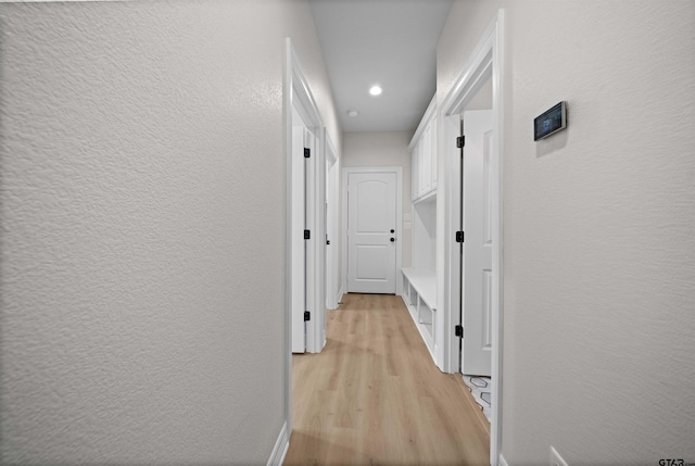 1838 Rocky Mtn, Tyler, TX 75703 - hallway with light wood-style floors, a textured wall, and recessed lighting