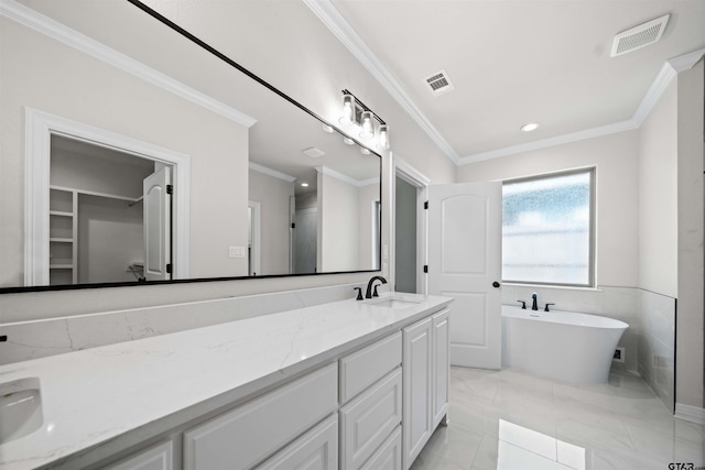 1838 Rocky Mtn, Tyler, TX 75703 - full bathroom with vanity, crown molding, a freestanding bath, a walk in closet, and recessed lighting