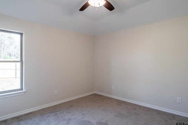 carpeted empty room with ceiling fan