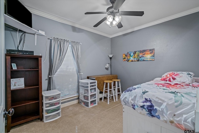 bedroom with ornamental molding, a ceiling fan, and light colored carpet