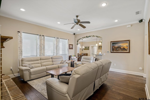 living room with dark wood-style floors, recessed lighting, ornamental molding, a ceiling fan, and baseboards