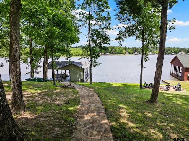 1509 Panther Creek Pass, Mount Vernon, TX 75457 - dock area featuring a yard and a water view