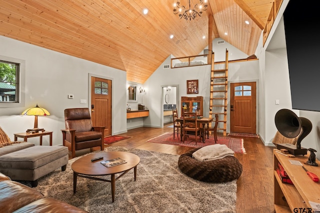 1509 Panther Creek Pass, Mount Vernon, TX 75457 - living room with wooden ceiling, a chandelier, wood finished floors, high vaulted ceiling, and baseboards