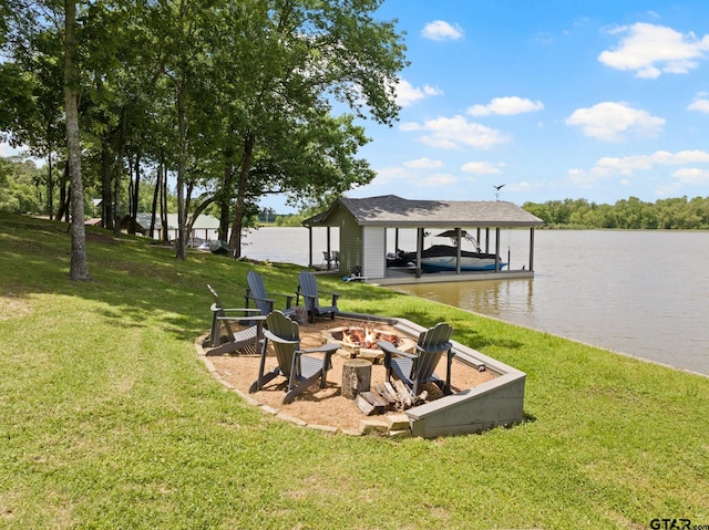 1509 Panther Creek Pass, Mount Vernon, TX 75457 - dock area with a fire pit, boat lift, a yard, and a water view