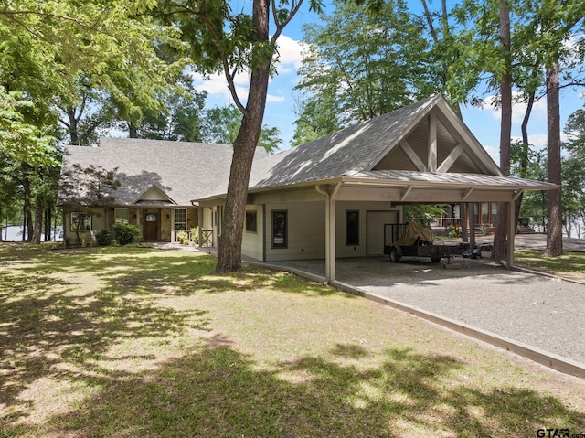 1509 Panther Creek Pass, Mount Vernon, TX 75457 - view of front of house with a carport, driveway, and a front lawn