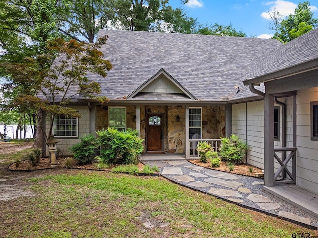 1509 Panther Creek Pass, Mount Vernon, TX 75457 - ranch-style house with roof with shingles and covered porch