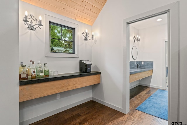 1509 Panther Creek Pass, Mount Vernon, TX 75457 - bathroom featuring wood ceiling, lofted ceiling, wood finished floors, vanity, and baseboards