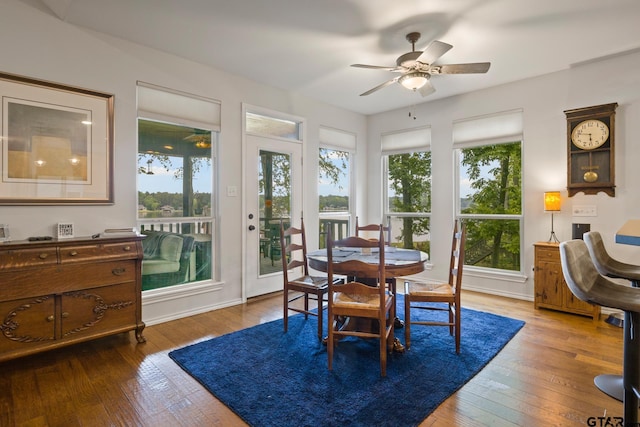 1509 Panther Creek Pass, Mount Vernon, TX 75457 - dining room featuring ceiling fan, hardwood / wood-style floors, and baseboards