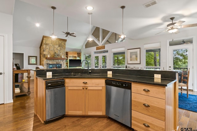 1509 Panther Creek Pass, Mount Vernon, TX 75457 - kitchen featuring stainless steel dishwasher, ceiling fan, open floor plan, a sink, and dark wood-type flooring