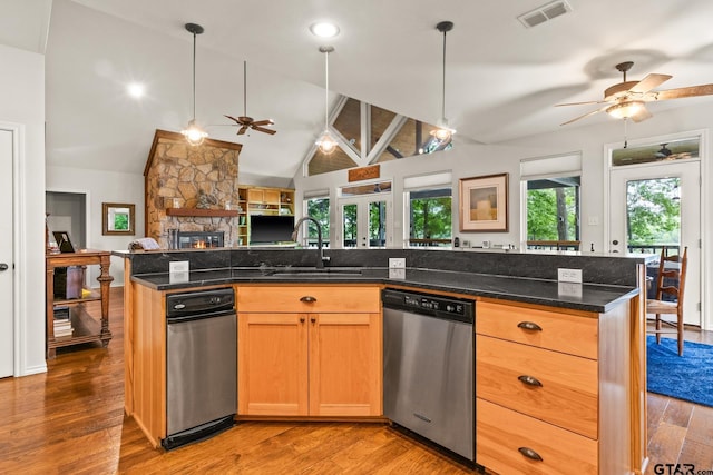 1509 Panther Creek Pass, Mount Vernon, TX 75457 - kitchen with dishwasher, a ceiling fan, open floor plan, a sink, and wood finished floors