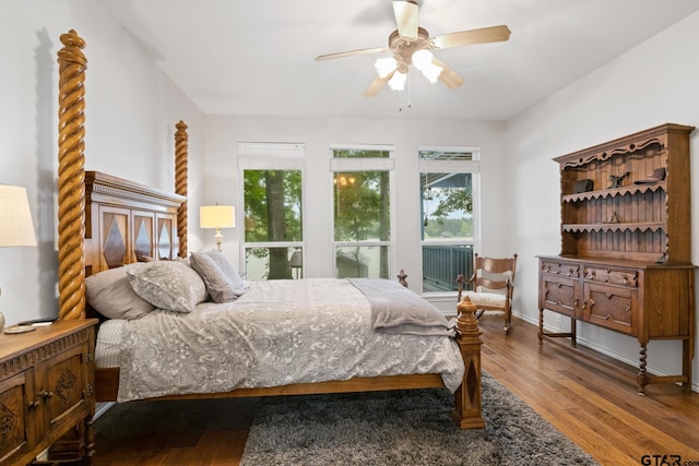 1509 Panther Creek Pass, Mount Vernon, TX 75457 - bedroom featuring wood finished floors, ceiling fan, and baseboards
