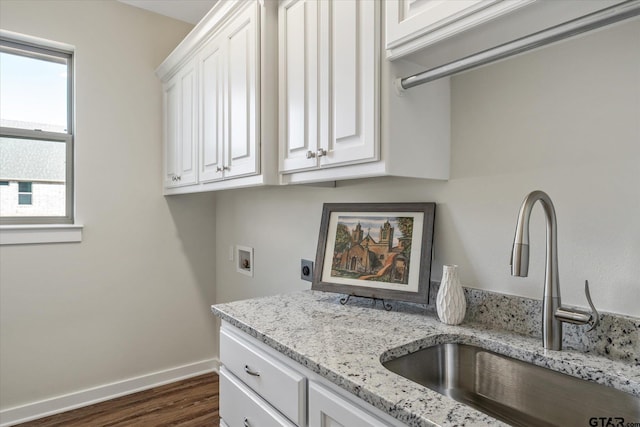 kitchen with sink and dark wood-type flooring