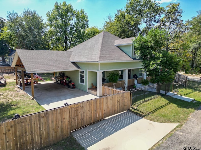 200 W Van St, Lindale, TX 75771 - view of front of property featuring roof with shingles, covered porch, and a carport