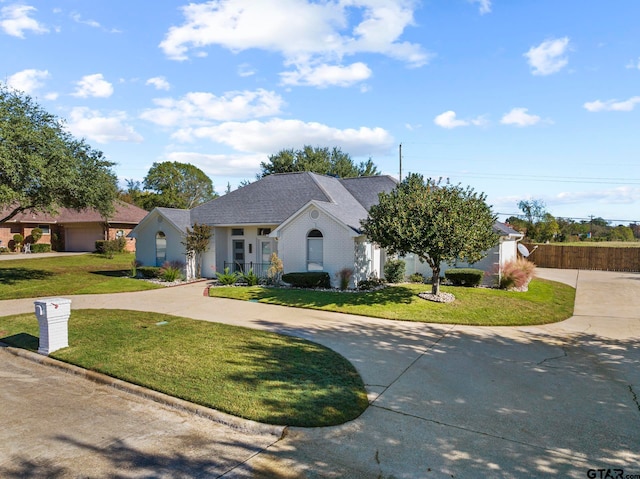 view of front facade with a front lawn