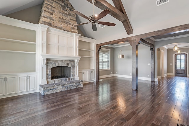 unfurnished living room with dark wood-type flooring, high vaulted ceiling, beamed ceiling, and a stone fireplace