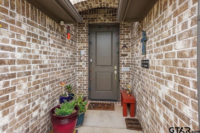 11317 Lindsey Gdns, Tyler, TX 75709 - doorway to property with brick siding