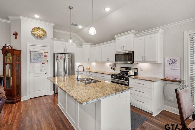11317 Lindsey Gdns, Tyler, TX 75709 - kitchen with appliances with stainless steel finishes, a sink, crown molding, dark wood-style flooring, and decorative backsplash