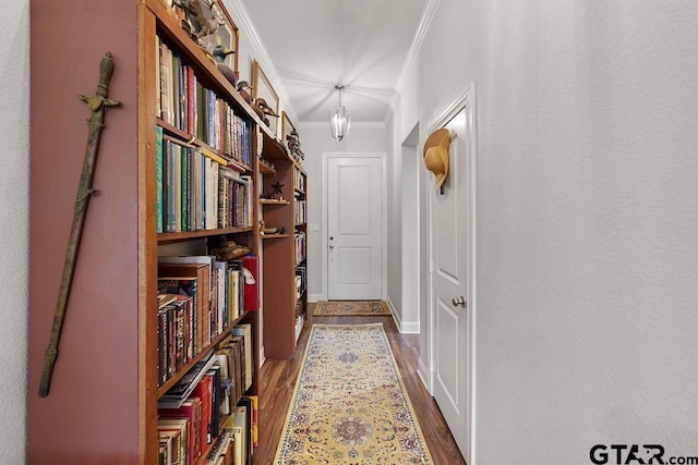 11317 Lindsey Gdns, Tyler, TX 75709 - hall featuring crown molding, dark wood-style floors, and baseboards