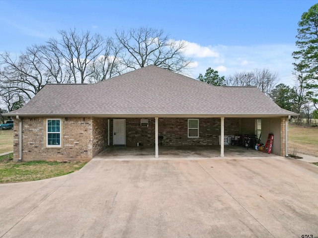 ranch-style house with a carport