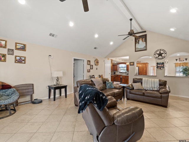 living room with high vaulted ceiling, beamed ceiling, light tile patterned flooring, and ceiling fan