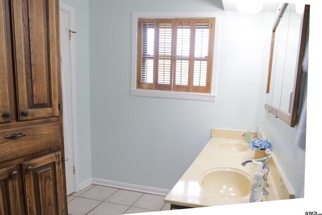 3008 Oak Knob Dr, Tyler, TX 75701 - bathroom featuring double vanity and tile patterned floors
