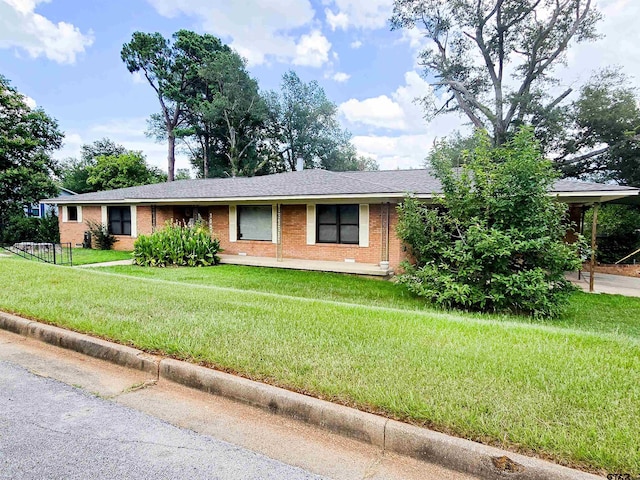 3008 Oak Knob Dr, Tyler, TX 75701 - ranch-style house with brick siding, a front lawn, and roof with shingles