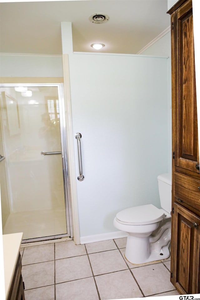 3008 Oak Knob Dr, Tyler, TX 75701 - bathroom with vanity, a shower stall, tile patterned floors, and crown molding