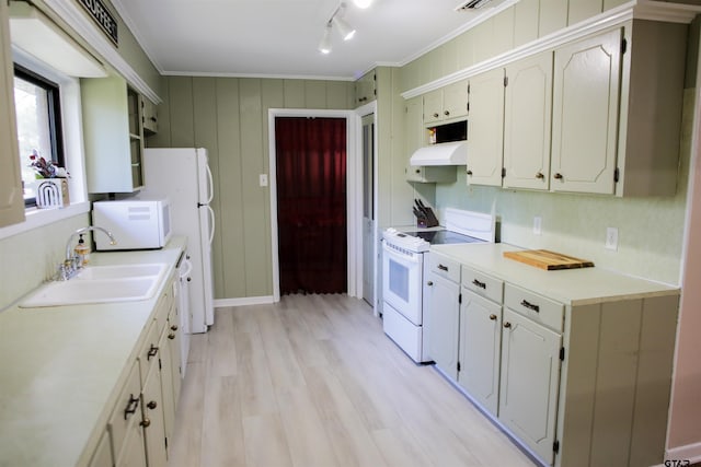 3008 Oak Knob Dr, Tyler, TX 75701 - kitchen featuring white appliances, custom exhaust hood, light countertops, light wood-type flooring, and ornamental molding