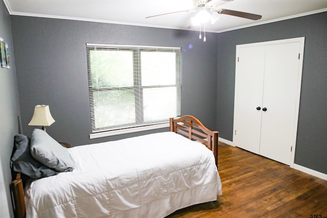 3008 Oak Knob Dr, Tyler, TX 75701 - bedroom with crown molding, wood finished floors, a closet, and a ceiling fan