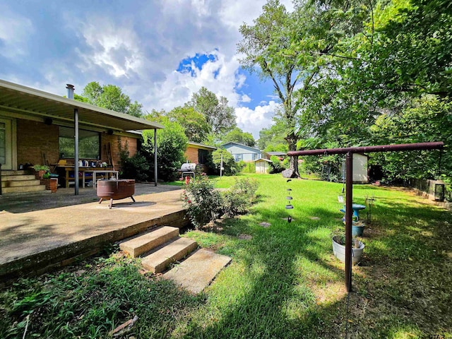 3008 Oak Knob Dr, Tyler, TX 75701 - view of green lawn with a patio area